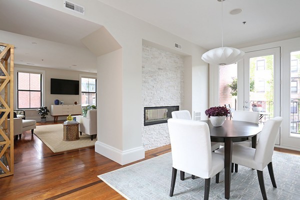 32 Rutland Street, Unit 2L Boston, MA 02118 - Photo 5 of 22 a view of a dining room with furniture window and wooden floor
