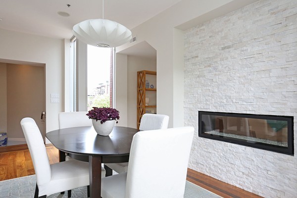 32 Rutland Street, Unit 2L Boston, MA 02118 - Photo 6 of 22 a living room with furniture wooden floor and a fireplace