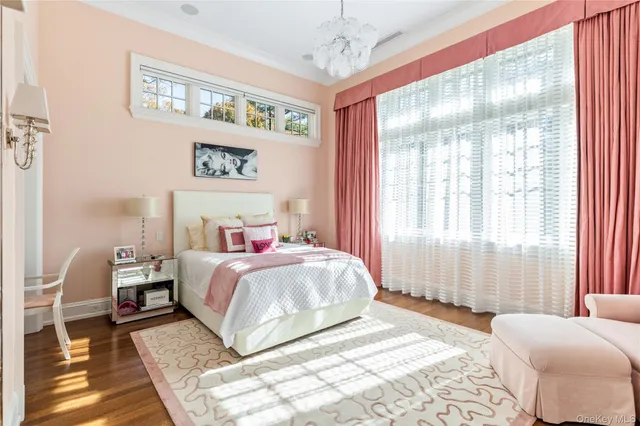 a bathroom with a toilet a sink and a mirror
