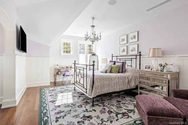 a bathroom with a granite countertop sink toilet and a mirror