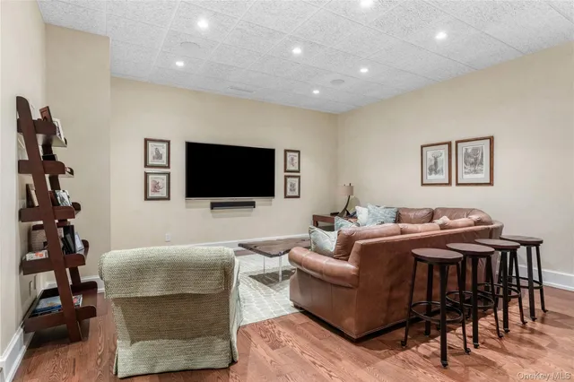 a view of a big yard with large trees