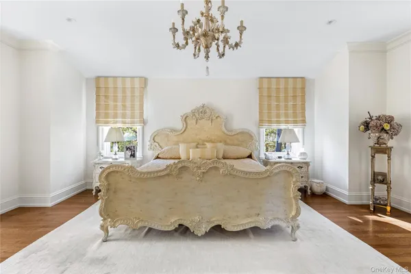 a room with a window and a mirror