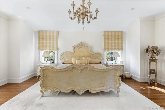 a room with a window and a mirror