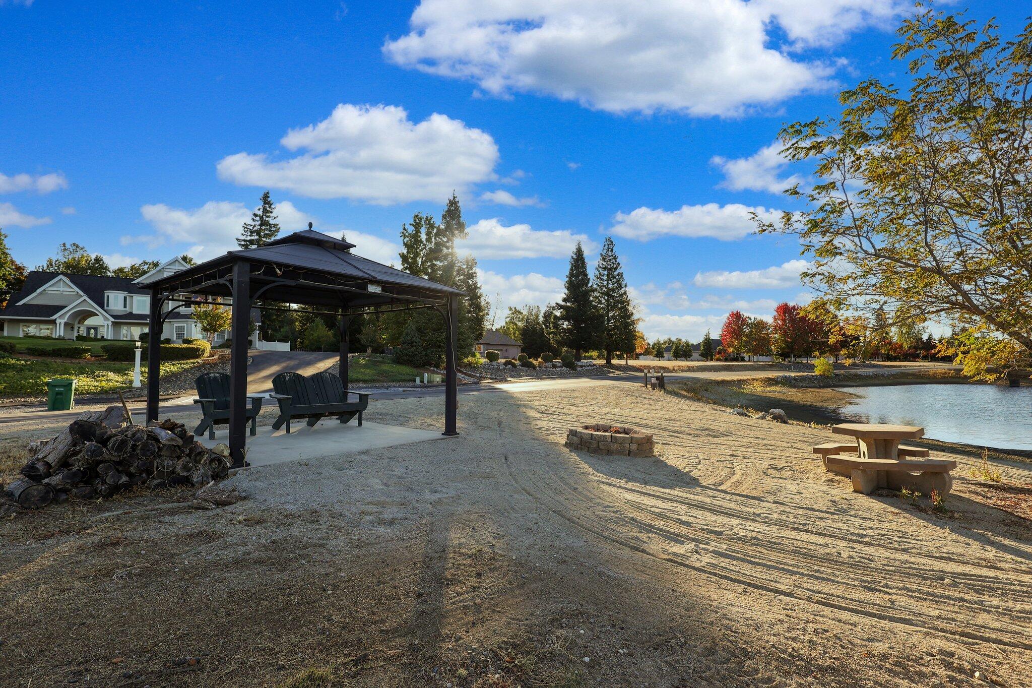 0 Spring Lake Street Redding, CA 96003 - Photo 20 of 24 a view of a lake with houses