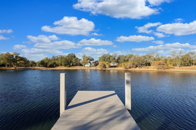 a view of a lake from a balcony