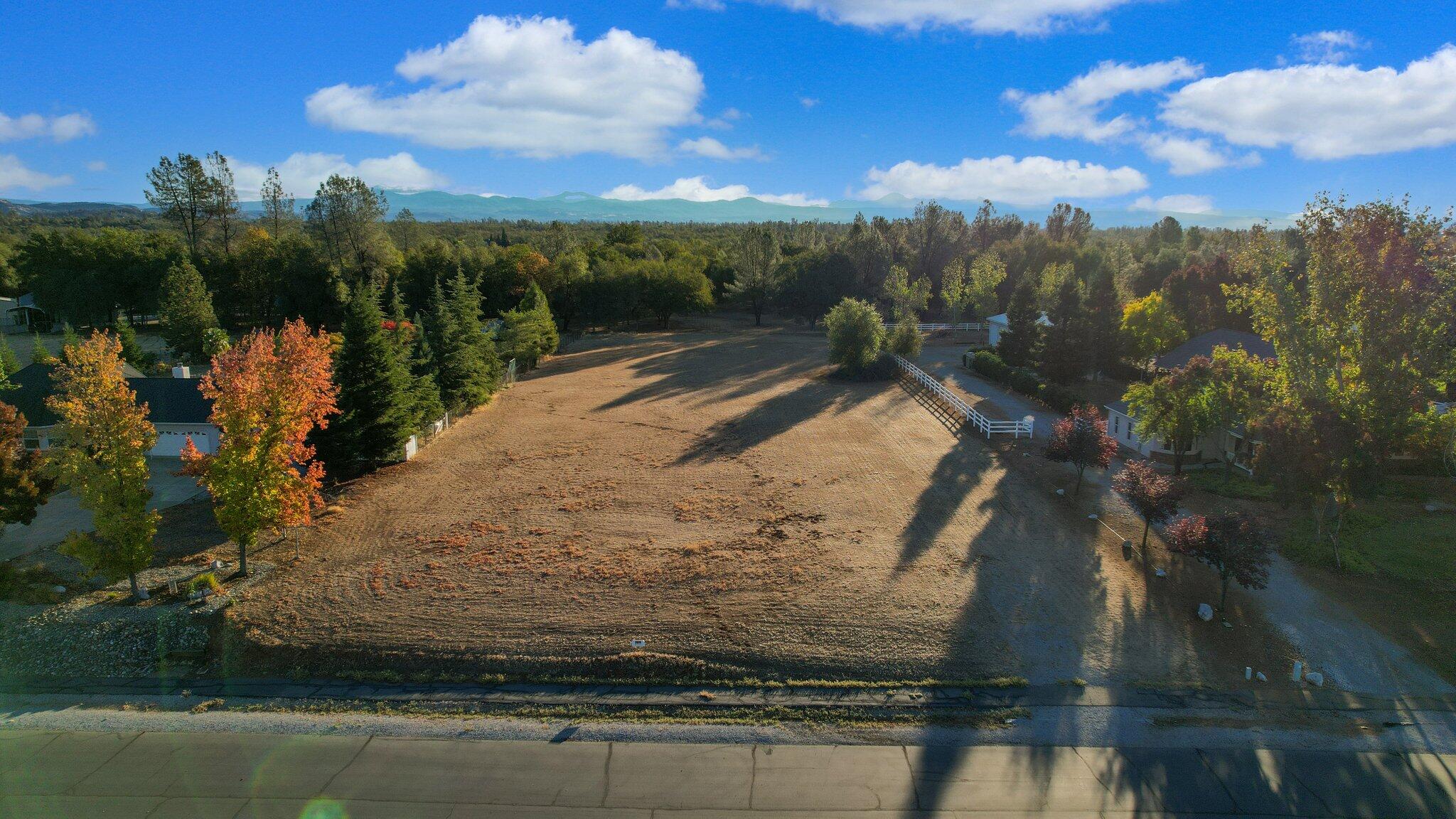 0 Spring Lake Street Redding, CA 96003 - Photo 22 of 24 a view of a backyard of a house