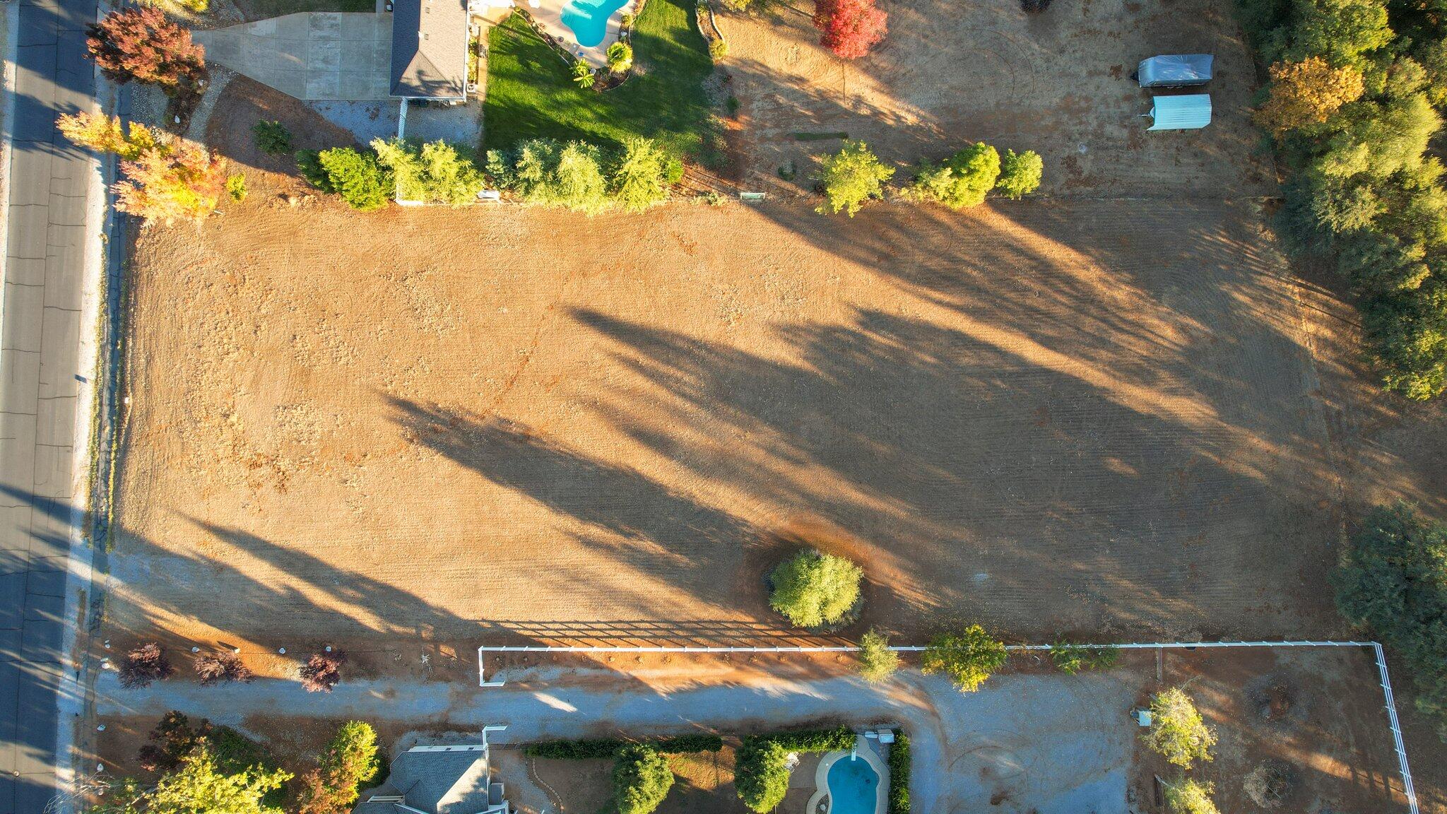 0 Spring Lake Street Redding, CA 96003 - Photo 23 of 24 a view of a yard with a street