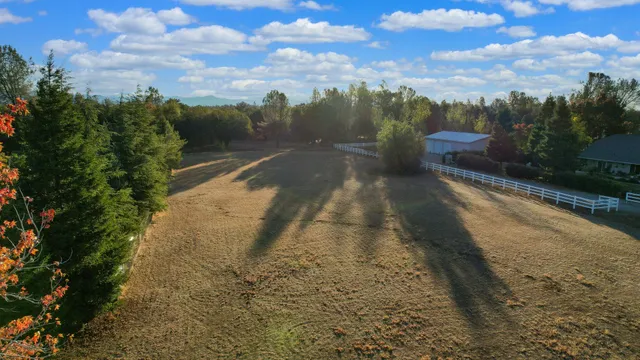a view of a yard with an outdoor space