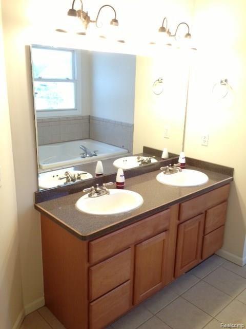 8543 Lee Road Brighton, MI 48116 - Photo 9 of 16 master bath with double lav