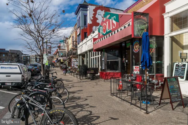 a front view of a building with large windows