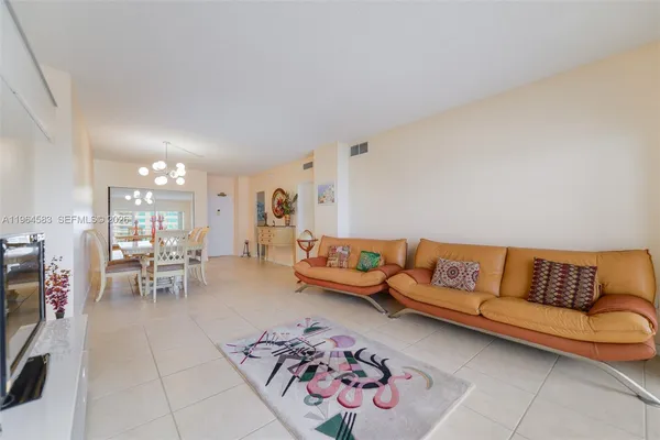 a living room with furniture and a couch