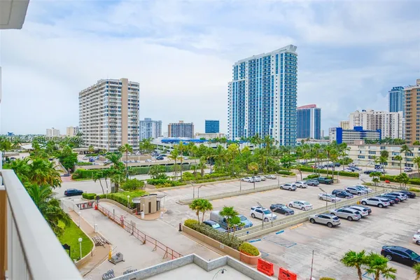 a view of a city with tall buildings