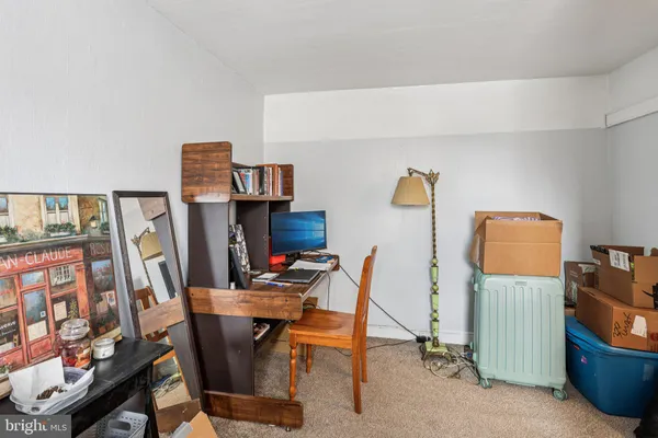 a view of a workspace with furniture