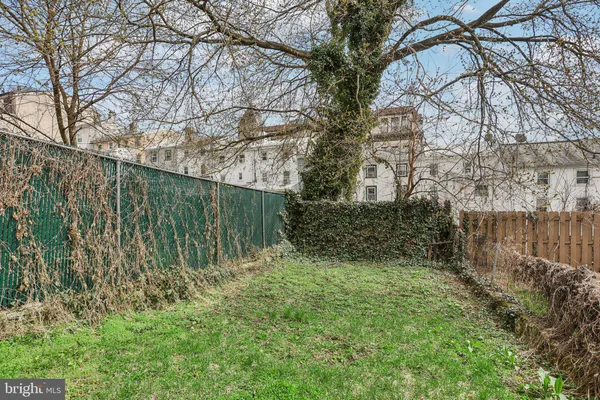 a view of multiple house with a yard