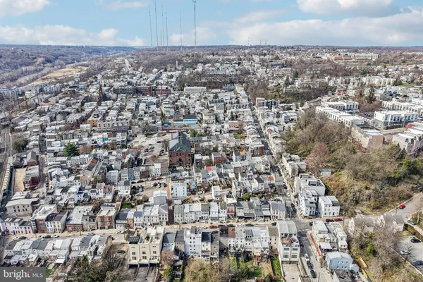 an aerial view of a city with lots of residential buildings