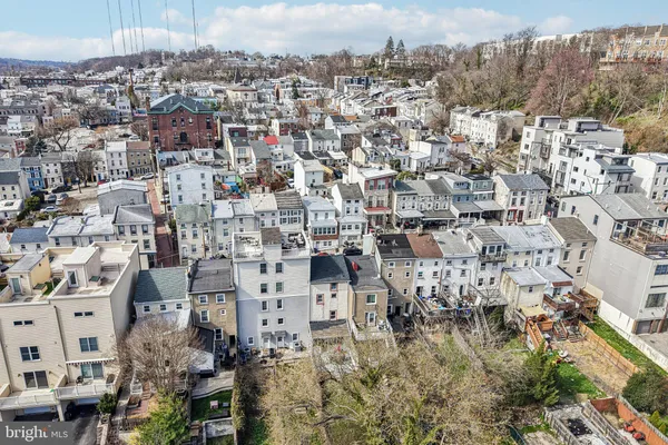 a front view of a building with glass windows