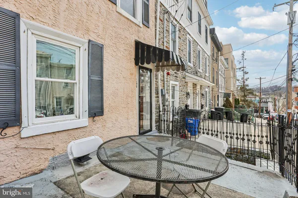 a building outdoor space with patio furniture