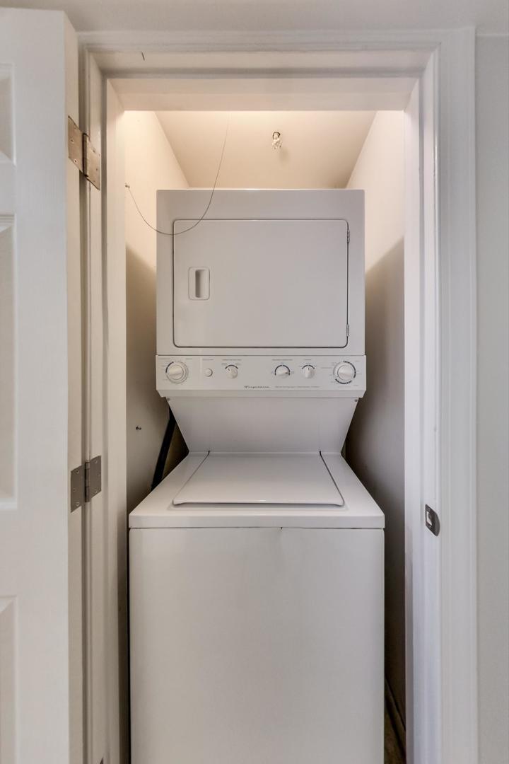 1422 West Lexington Street, Unit 2F Chicago, IL 60607 - Photo 15 of 19 a view of bathroom with a washer and dryer