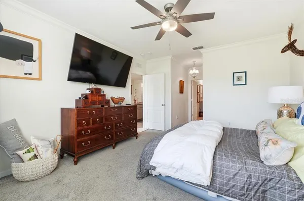 a bathroom with a sink vanity and a mirror