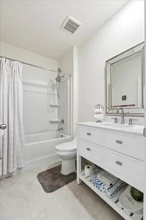 a room with furniture and a window