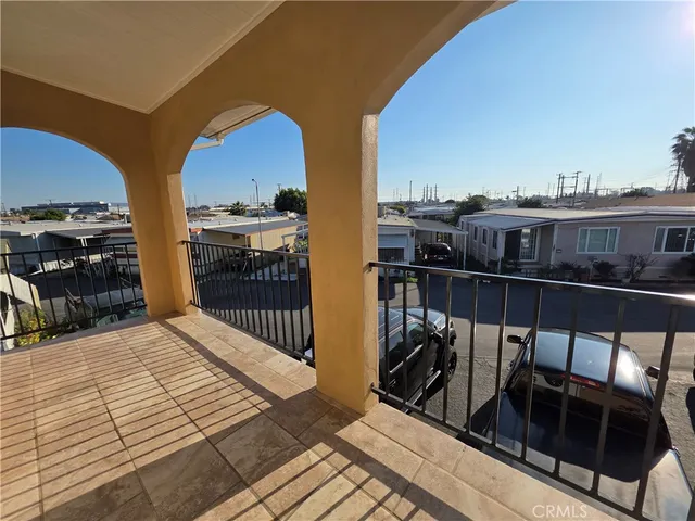 a view of balcony with chairs