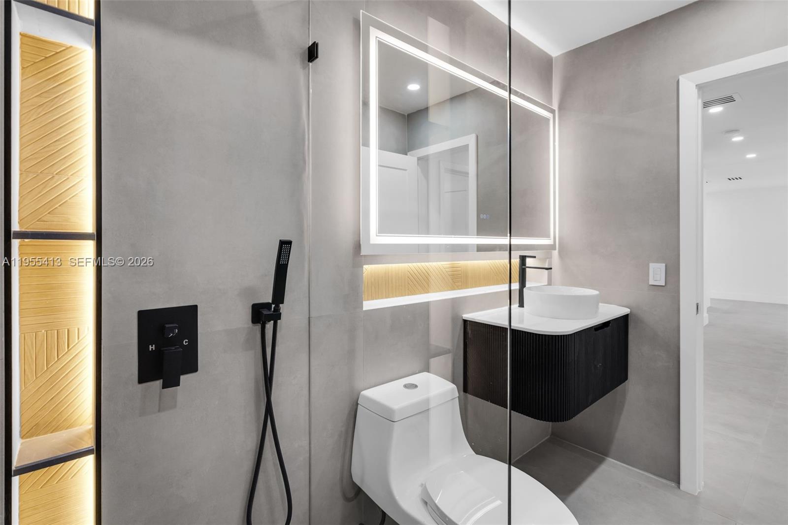 1293 Southwest 22nd Avenue, Unit 1 Miami, FL 33135 - Photo 23 of 28 a bathroom with a sink toilet and shower