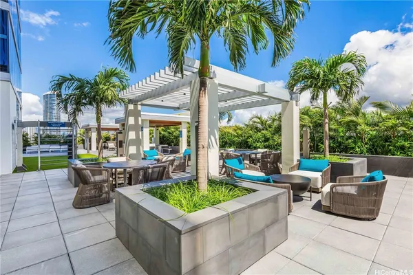 a view of an outdoor sitting area with a tub