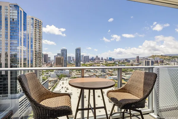 a view of a chairs and table on the terrace