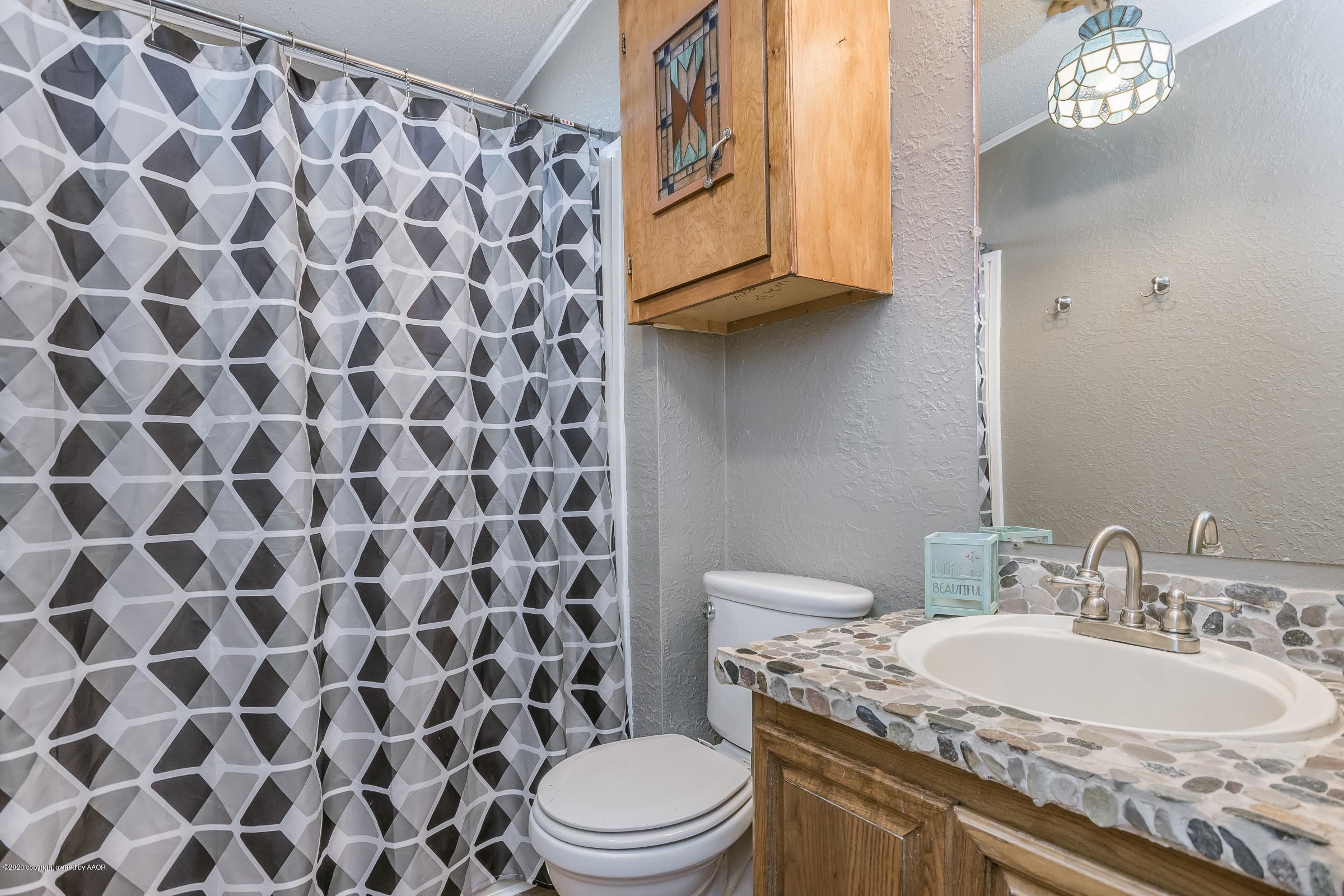 1534 South Mesa Road Canyon, TX 79015 - Photo 18 of 29 018_Hall Bathroom