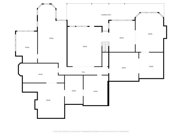 a picture of door with a white wall