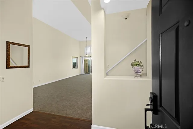 a bathroom with double vanity sinks and a mirror