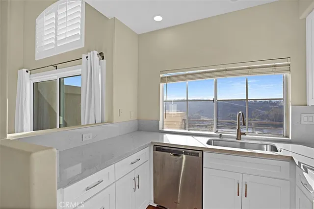 a front view of a house with a garage