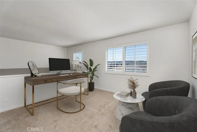 a close view of a utility room with dryer and washer