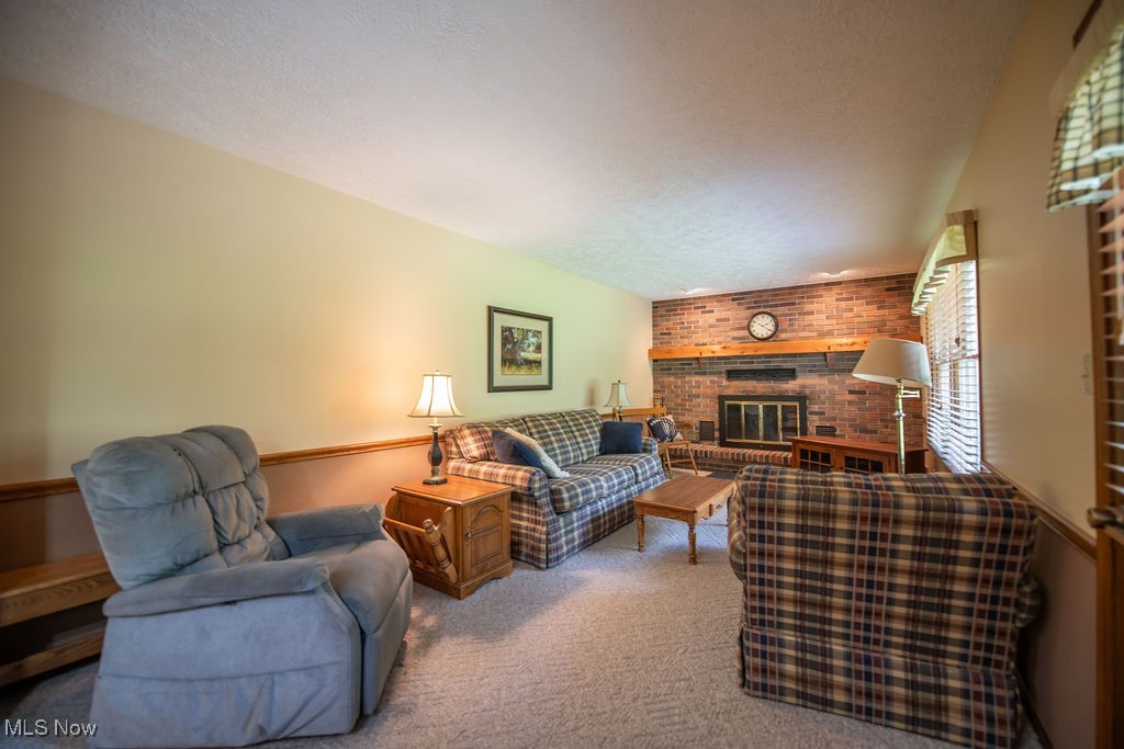3949 Bair Road Northwest Dover, OH 44622 - Photo 15 of 48 Family room view with fireplace