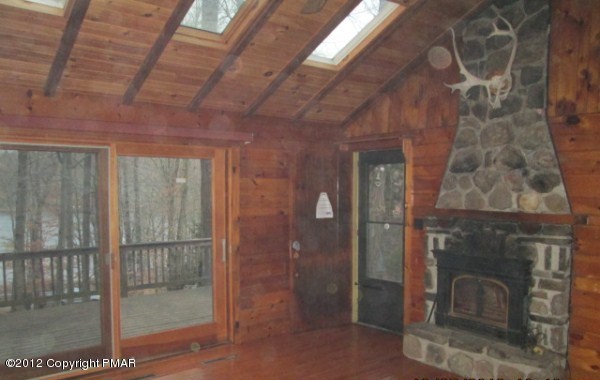 202 Deerfoot Road Lake Ariel, PA 18436 - Photo 2 of 9 Living room w/fireplace