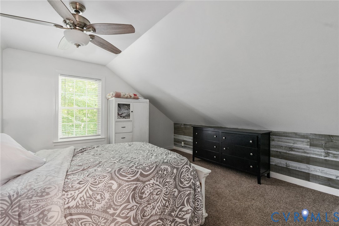 1755 Dispatch Road Quinton, VA 23141 - Photo 58 of 86 a bedroom with a bed and a closet