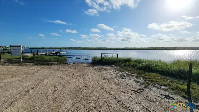 a view of a back yard of a house