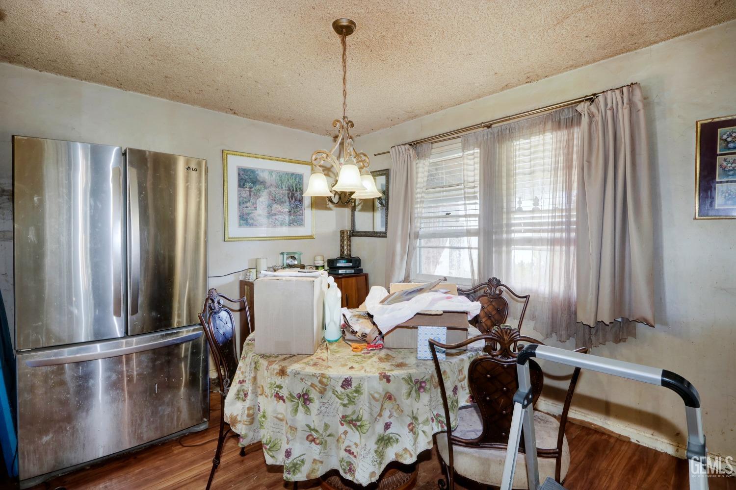 Undisclosed Address Sacramento, CA 95821 - Photo 19 of 33 a very nice looking room with furniture window and wooden floor