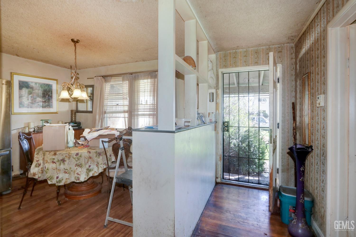 Undisclosed Address Sacramento, CA 95821 - Photo 20 of 33 a view of a livingroom with furniture wooden floor and a chandelier