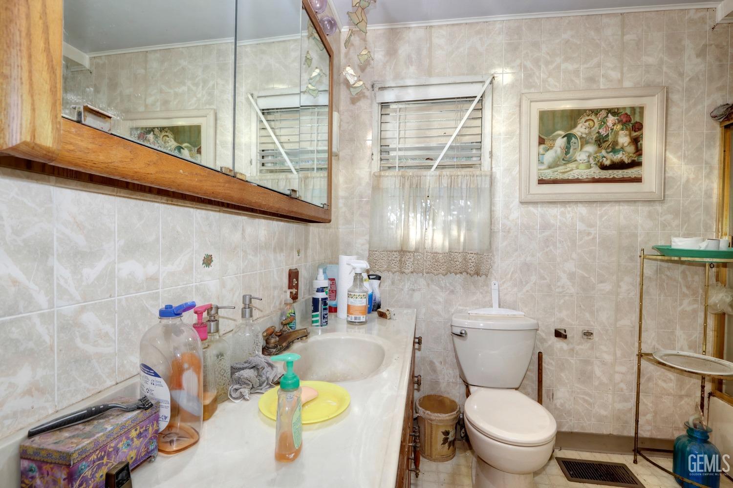 Undisclosed Address Sacramento, CA 95821 - Photo 23 of 33 a bathroom with a toilet and a shower