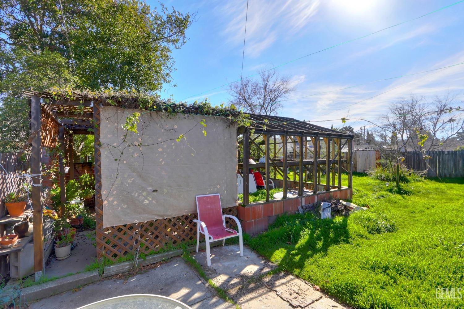 Undisclosed Address Sacramento, CA 95821 - Photo 29 of 33 a view of a chairs and table in a backyard
