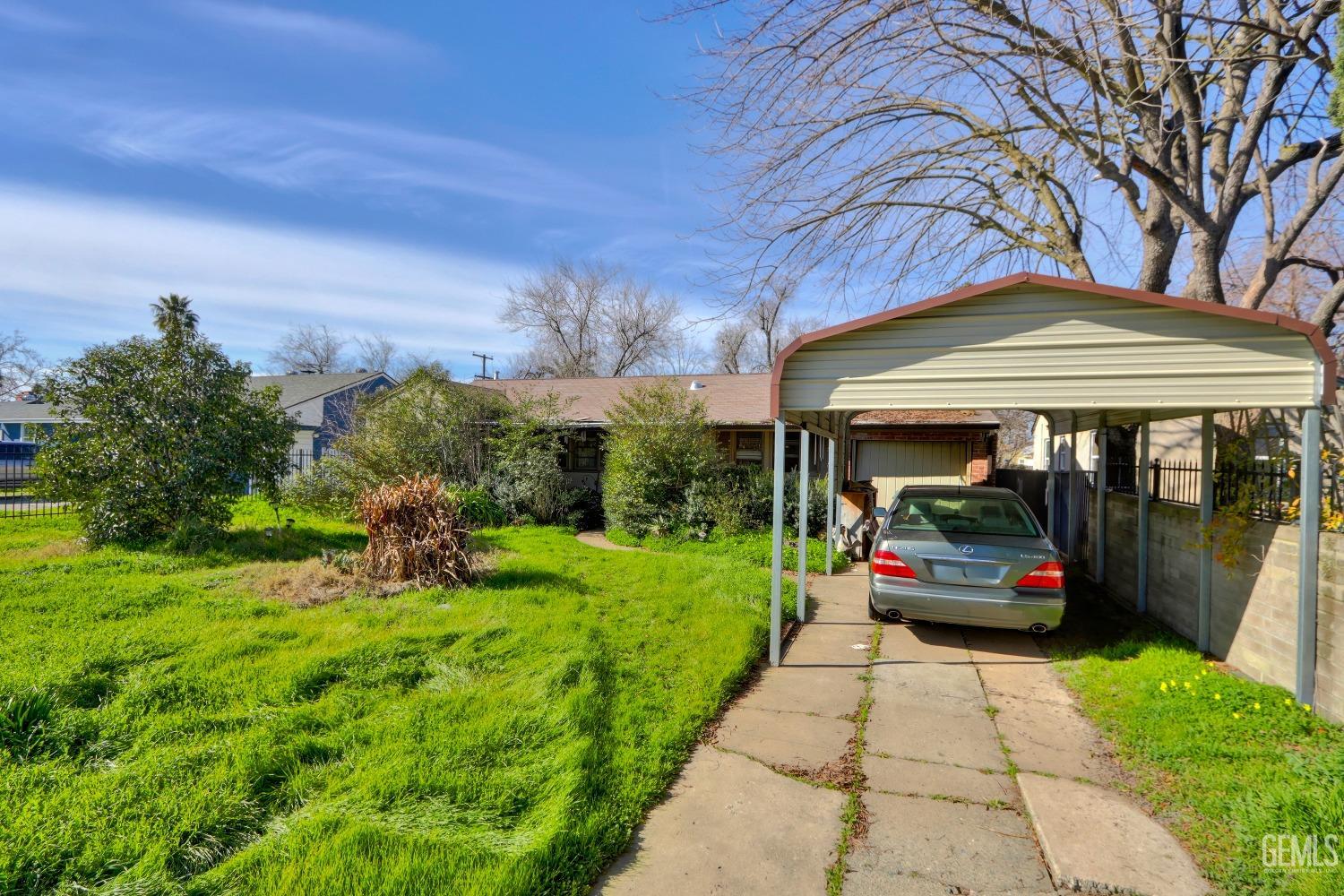 Undisclosed Address Sacramento, CA 95821 - Photo 32 of 33 a front view of a house with garden