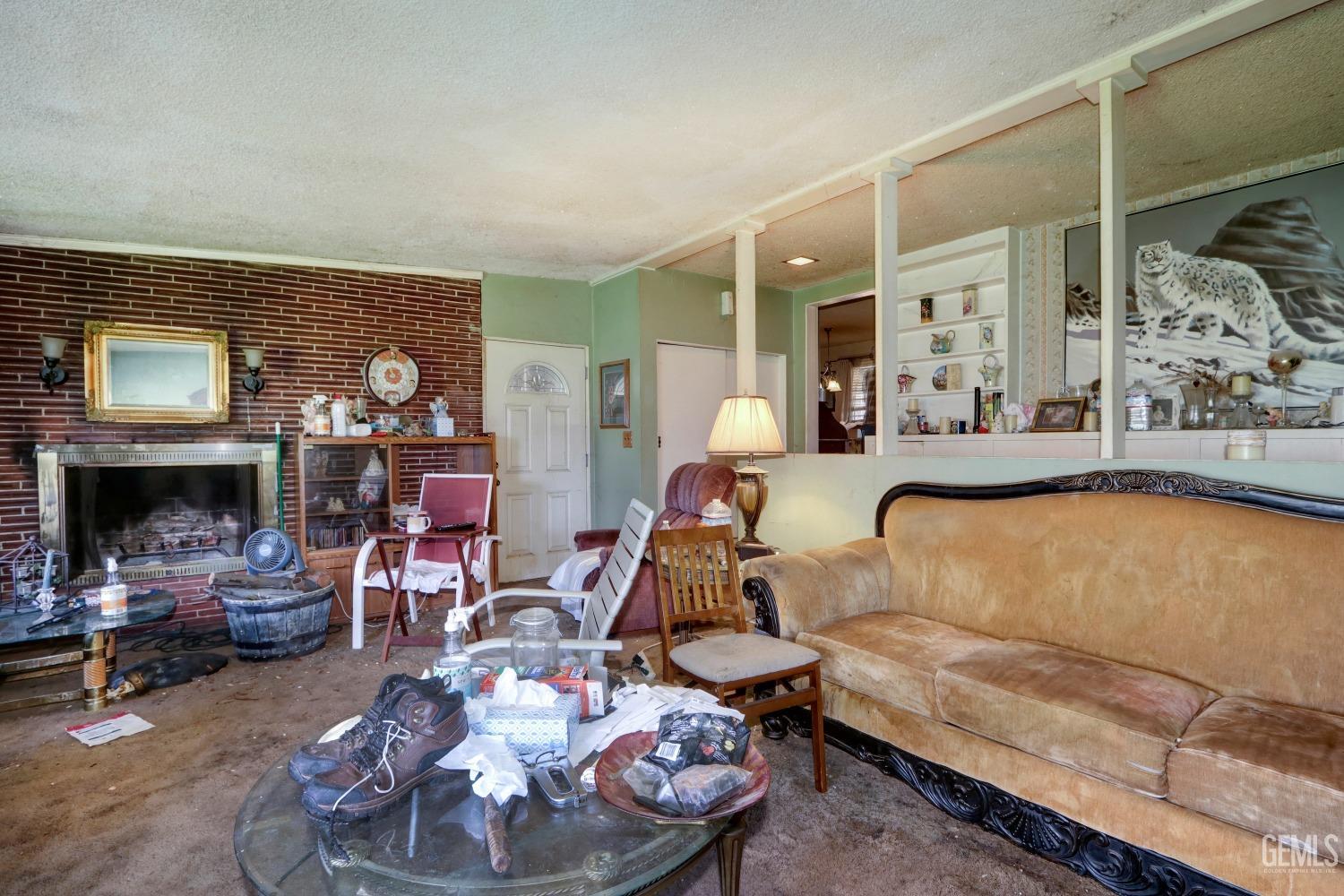Undisclosed Address Sacramento, CA 95821 - Photo 4 of 33 a living room with furniture and a fireplace