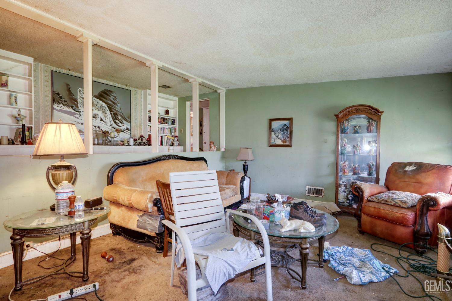 Undisclosed Address Sacramento, CA 95821 - Photo 6 of 33 a bedroom with furniture and a chair