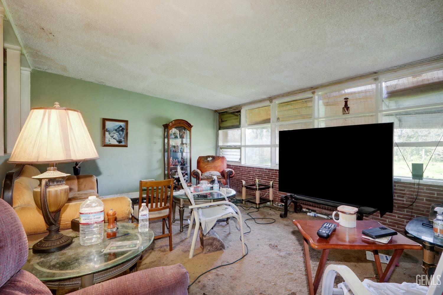 Undisclosed Address Sacramento, CA 95821 - Photo 7 of 33 a living room with furniture and a flat screen tv