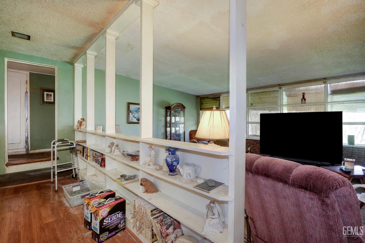 Undisclosed Address Sacramento, CA 95821 - Photo 8 of 33 a living room with furniture and a flat screen tv