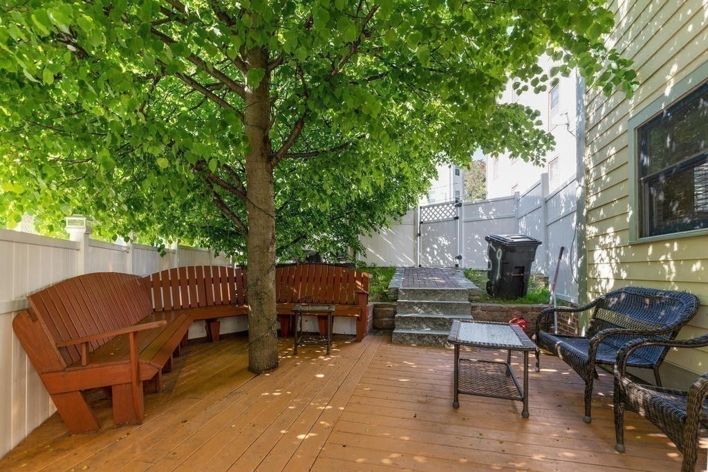 59 Fulda Street, Unit A Boston, MA 02119 - Photo 15 of 18 a view of backyard with seating area and furniture
