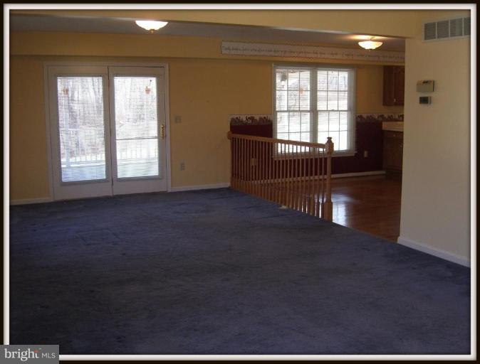 911 Edgewood Road Edgewood, MD 21040 - Photo 18 of 28 Living Rm/Family Rm w/ French Drs leading to Deck