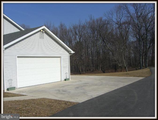 911 Edgewood Road Edgewood, MD 21040 - Photo 4 of 28 Car Pad, Garage, & part of Backyard