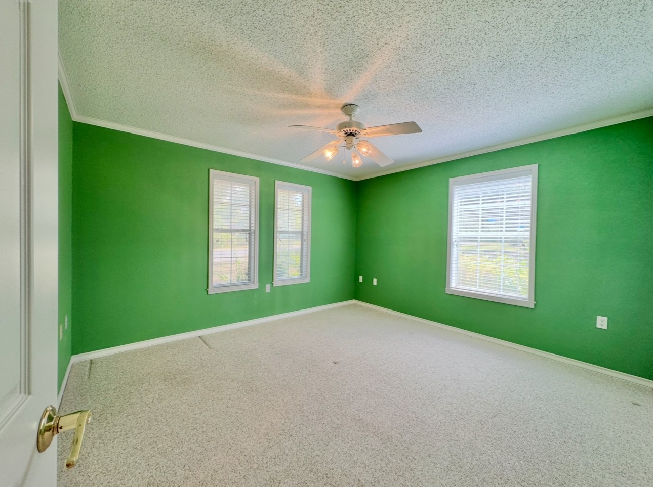 608 Mogonye Lane Elgin, TX 78621 - Photo 16 of 38 a view of an empty room with a window and a ceiling fan